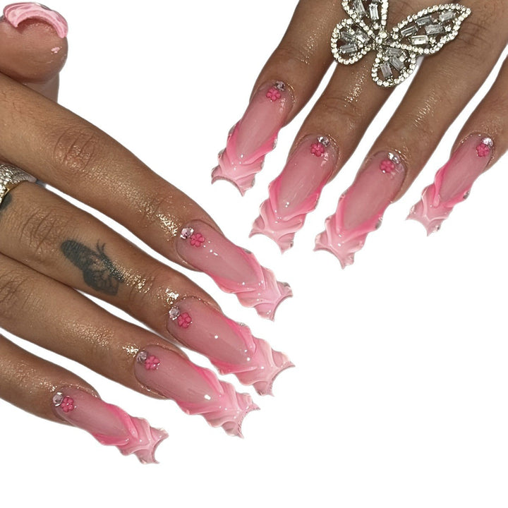 Artificial nail set with floral 3D design and glittering accents Stornfield