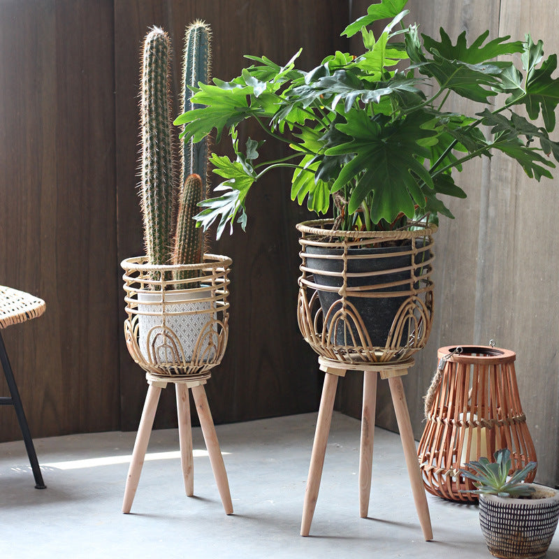Stylish plant stand made of rattan and wood Stornfield