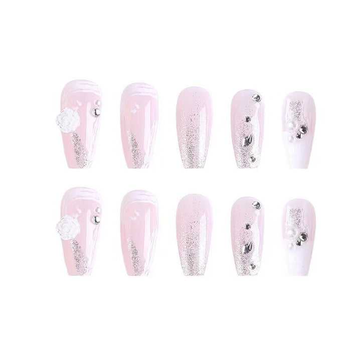 Elegant artificial nails with glitter and flower decoration Stornfield