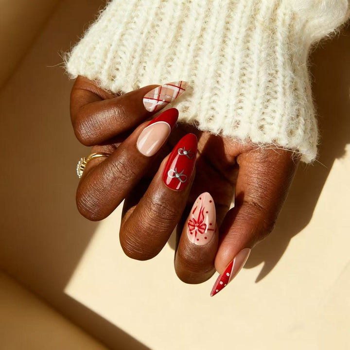 Artful nail extensions with elegant patterns and embellishments Stornfield