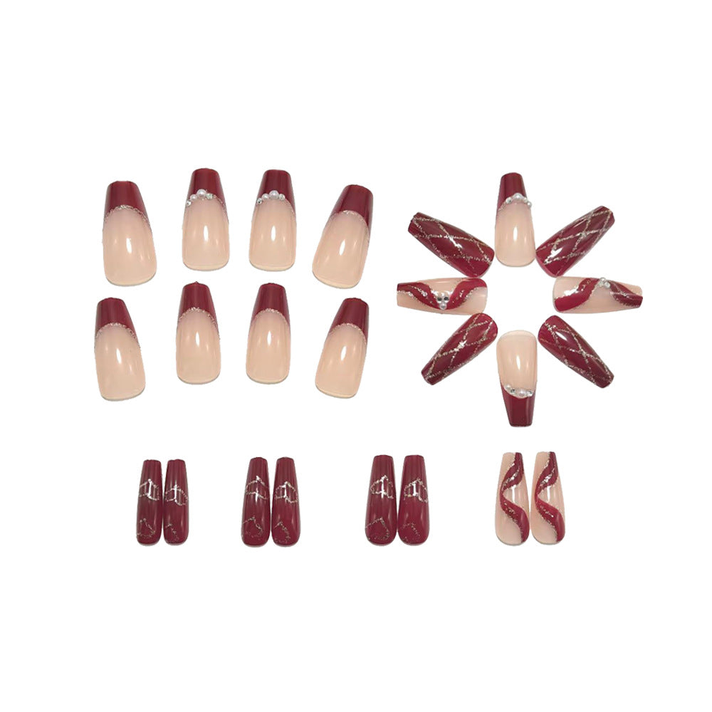 Artificial nails with elegant pearl and glitter decorations Stornfield