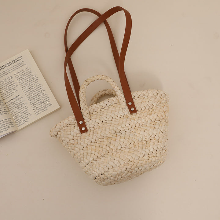 Handcrafted straw bag with sturdy leather handles Stornfield