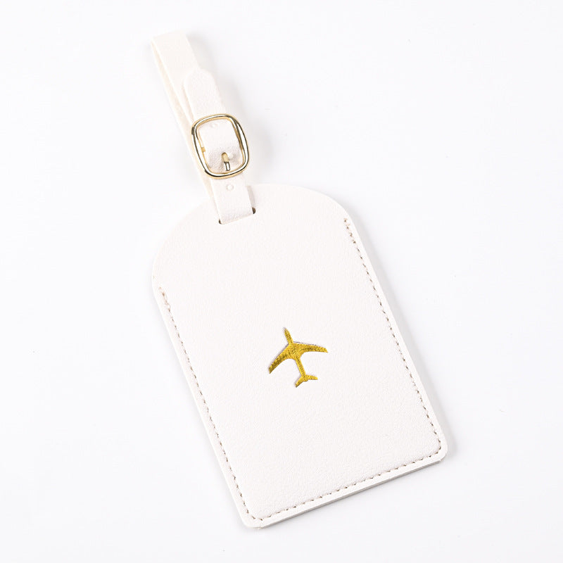 premium leather luggage tag with adjustable buckle strap and embossed airplane Stornfield