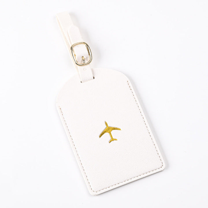 premium leather luggage tag with adjustable buckle strap and embossed airplane Stornfield