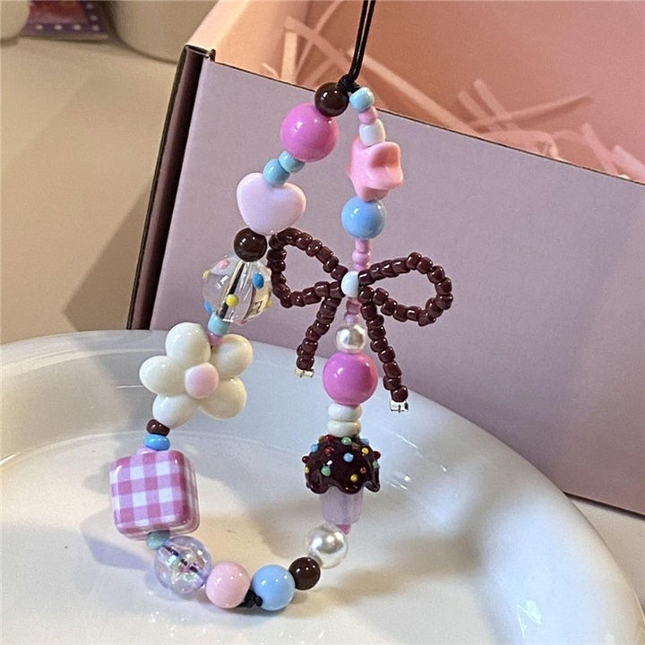 Playful Beaded Charm Phone Strap Stornfield