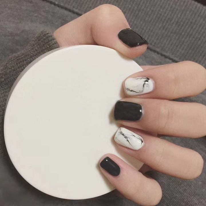 Artificial nail set with luxurious marble design and elegant high-gloss finish Stornfield