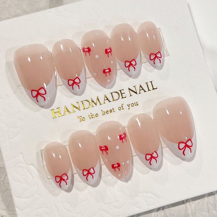 Artful nail extensions with an elegant leaf pattern Stornfield