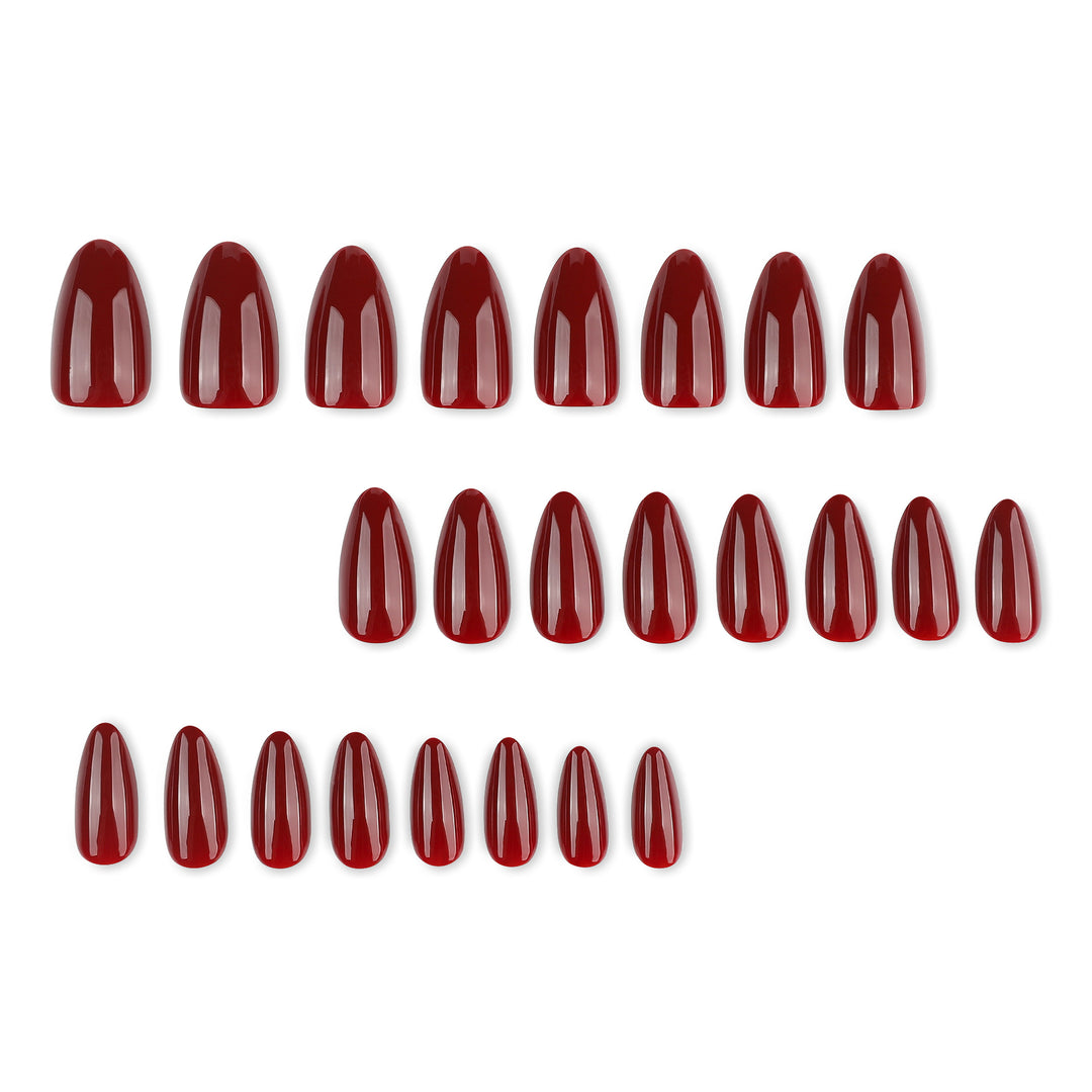 Glamorous stiletto nails with high gloss and elegant design accents Stornfield
