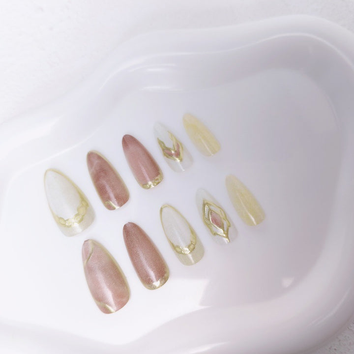 Artificial nails with floral gold accents and glossy finish Stornfield