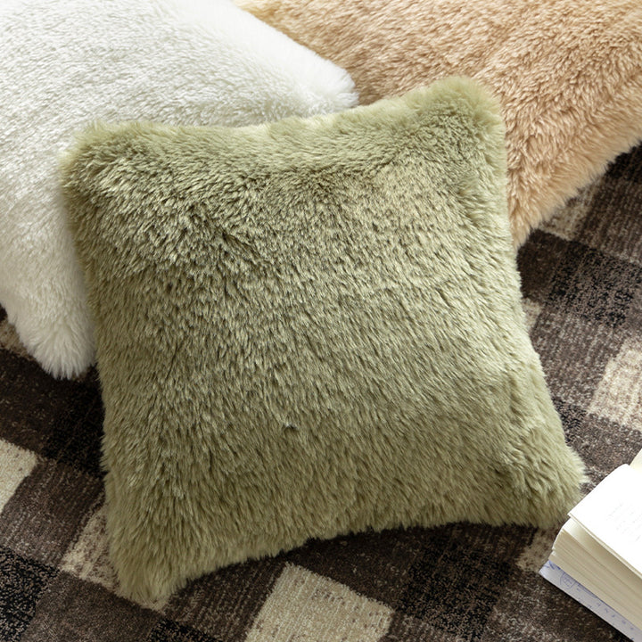 High pile rectangular cushion made of artificial fur with fine texture and zipper