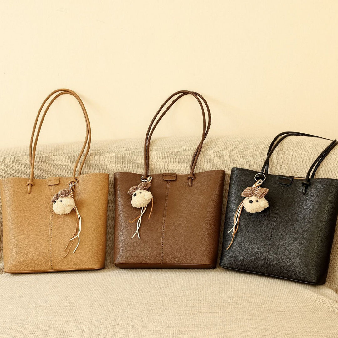 Textured Handheld Tote Bag with Decorative Charm