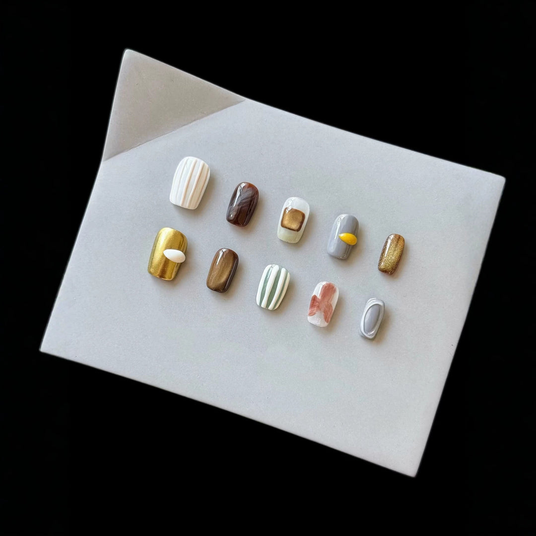 Artistic Press-On Nail Set with Unique Textured Designs