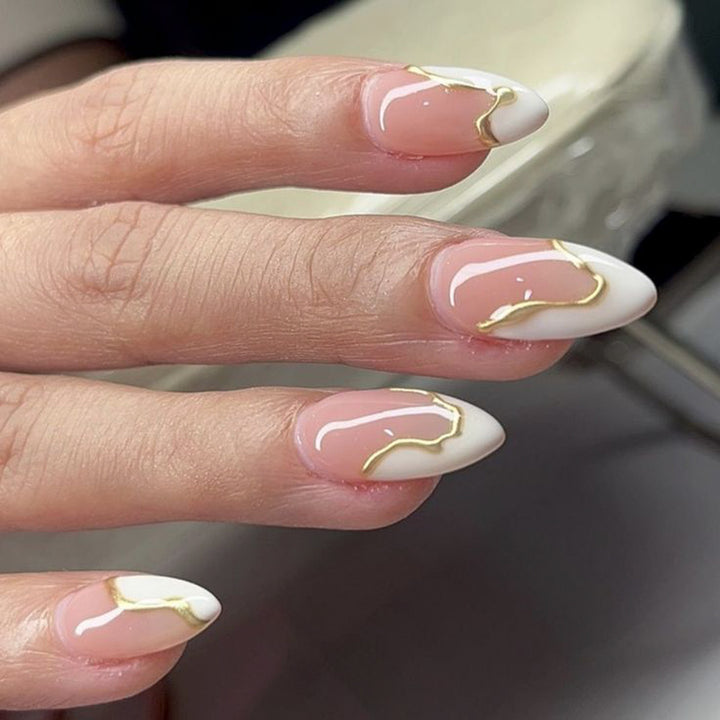 Elegant artificial nails with gold accents Stornfield