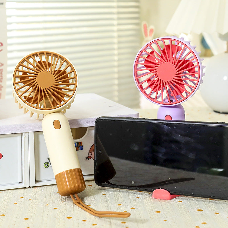 Women's Portable Mini Fan with Ergonomic Grip and USB Charging Function Stornfield