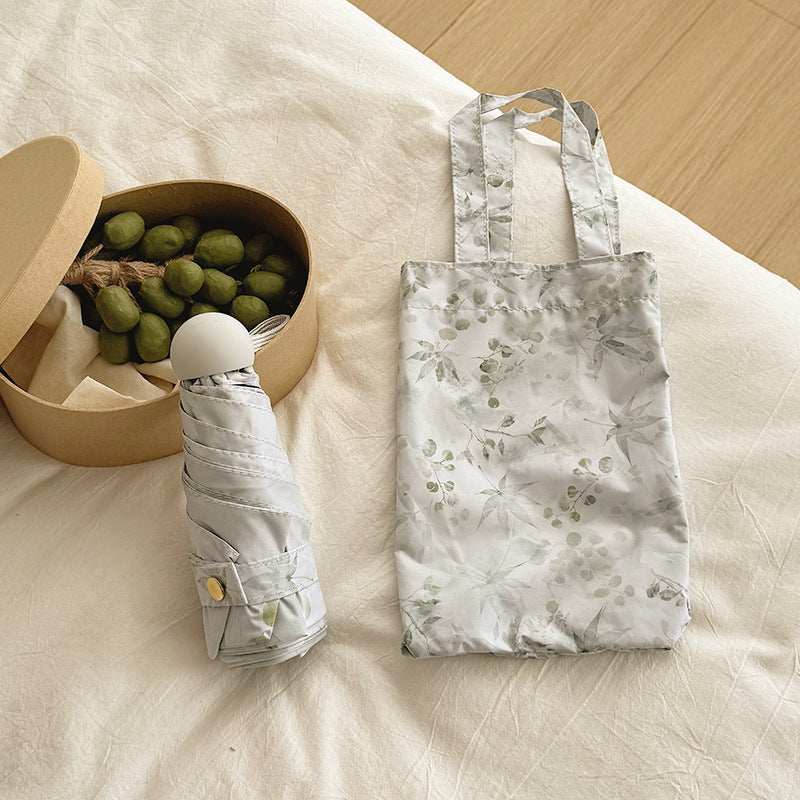 Women's Foldable Umbrella with Elegant Botanical Pattern Stornfield
