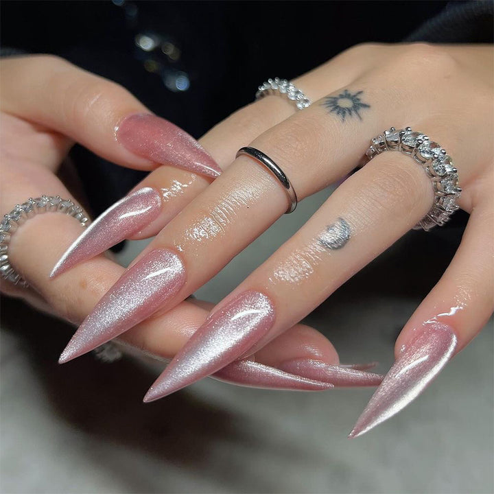 Artful Stiletto Nails with Shimmering Glitter Stornfield