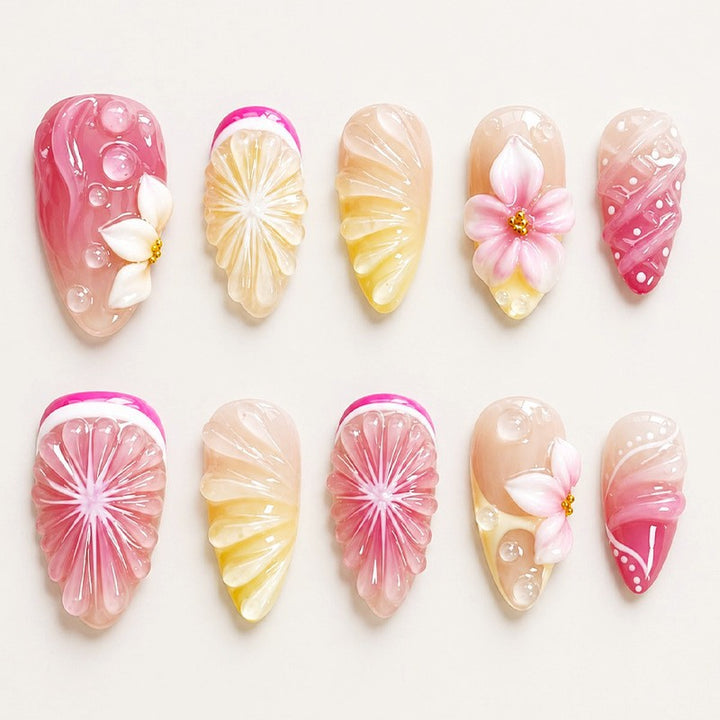 Artificial nail set with elegant floral details and glitter effects Stornfield