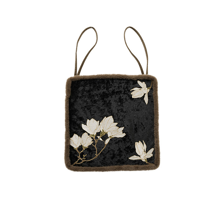 Padded seat cushion with velvet cover, floral embroidery and faux fur trim Stornfield
