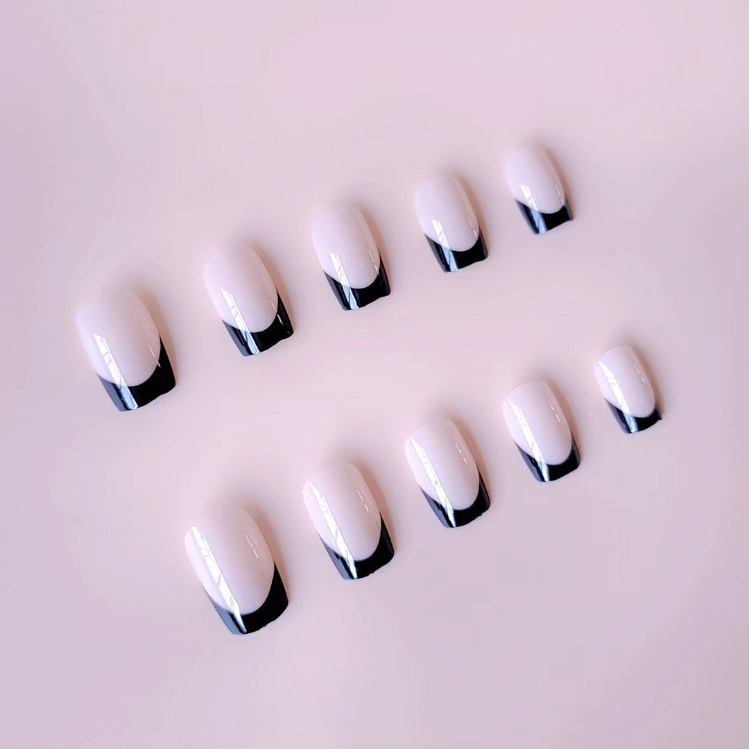 Acrylic nail set with elegant French tips and matte finish Stornfield