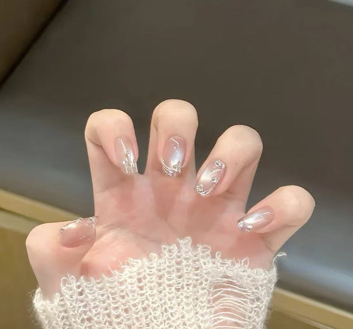 Artificial nails with glamorous rhinestone design Stornfield