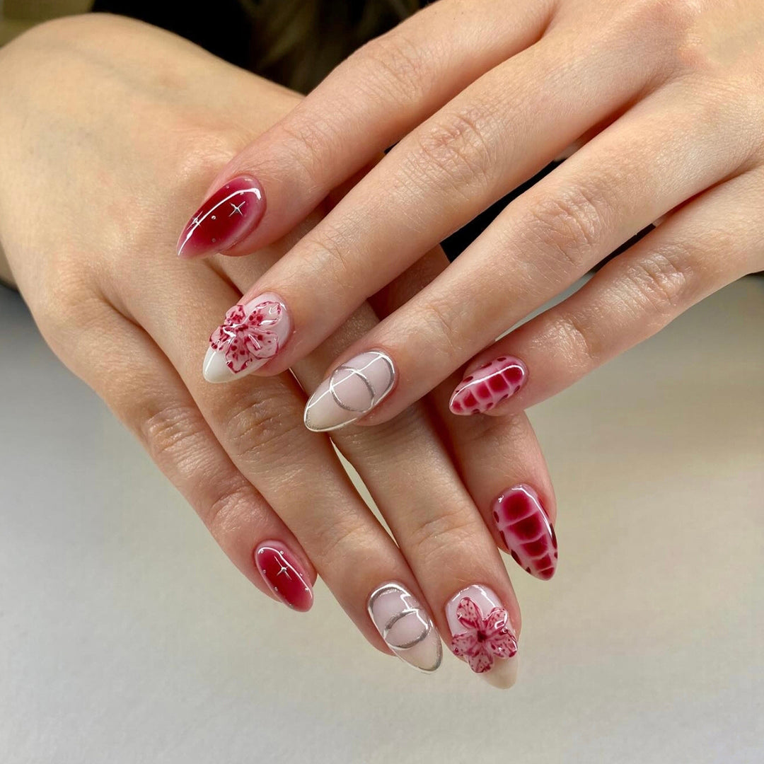 Artificial nails with floral accents and modern patterns Stornfield