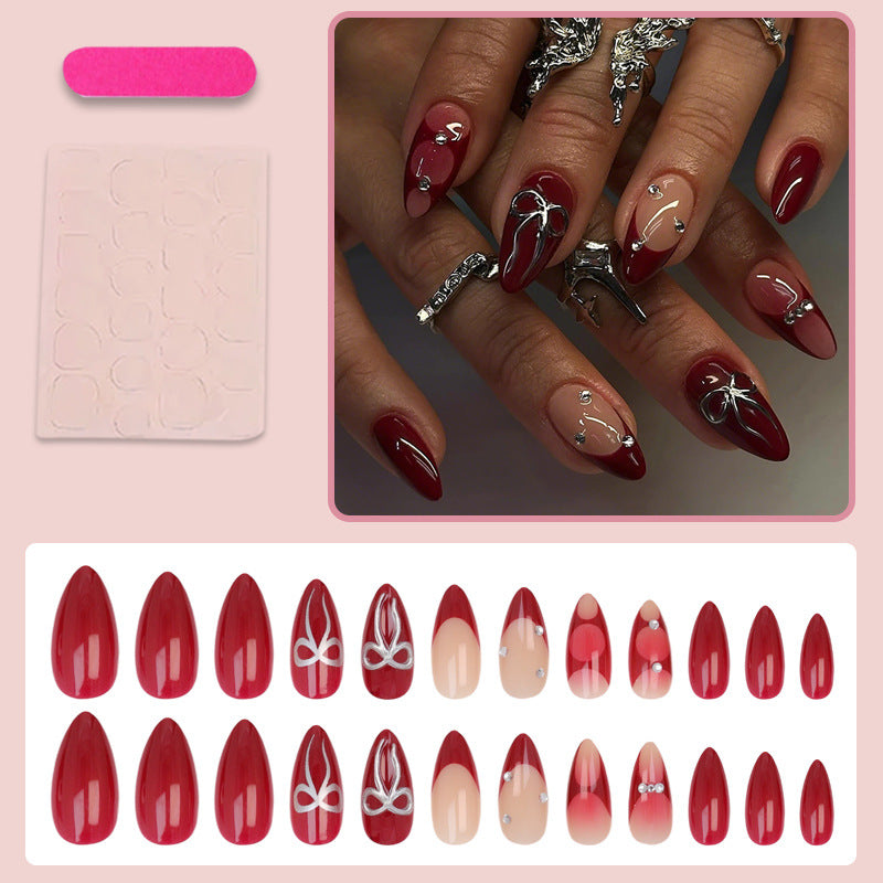 Artificial nail set with luxurious glitter and gemstone embellishments Stornfield
