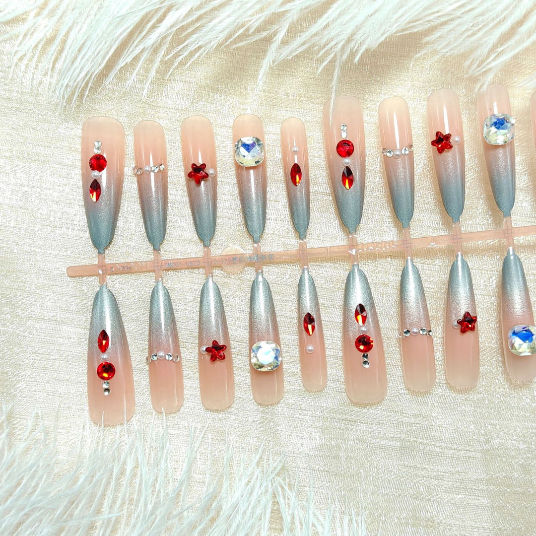 Artificial nails with glamorous design and sparkling accents Stornfield