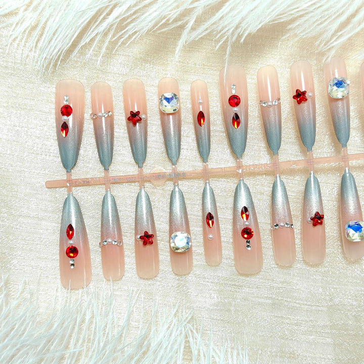 Artificial nails with glamorous design and sparkling accents Stornfield