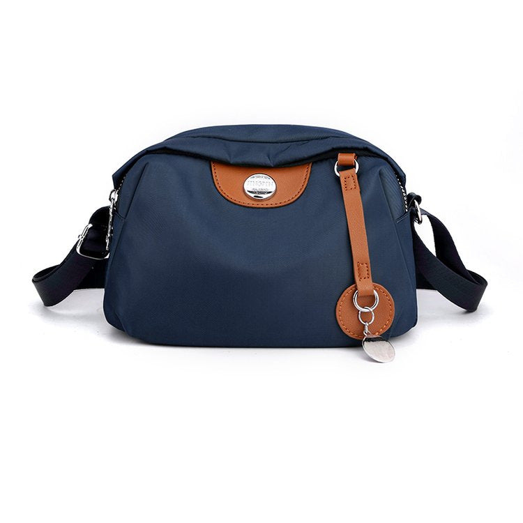 Shoulder bag with adjustable shoulder strap and clear compartment system Stornfield