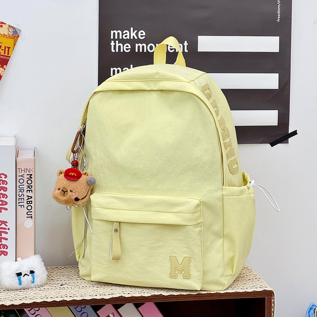 Stylish Canvas Backpack with Plush Keychain Stornfield