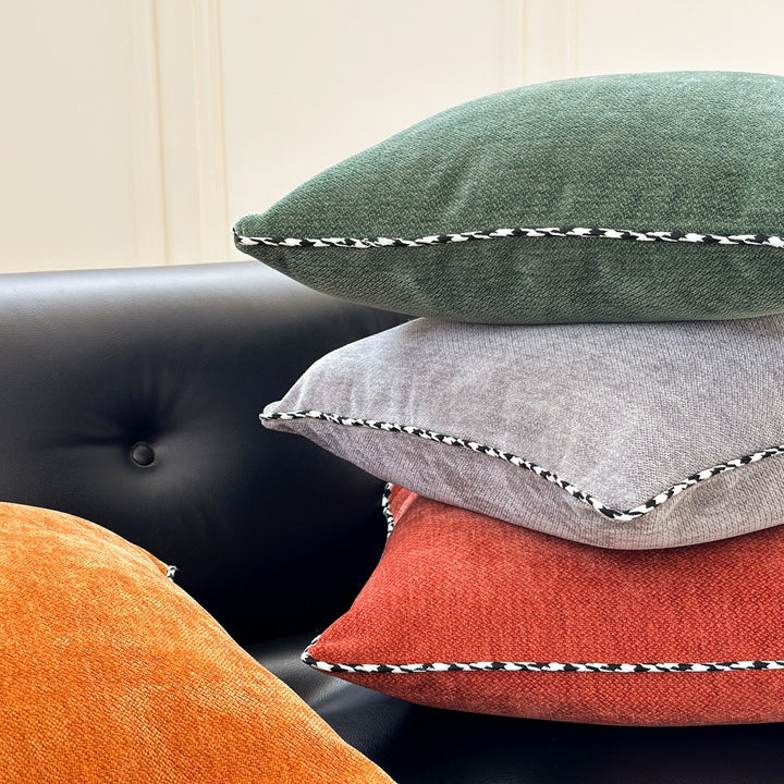 Decorative square decorative pillow made of soft velvet with contrasting piping
