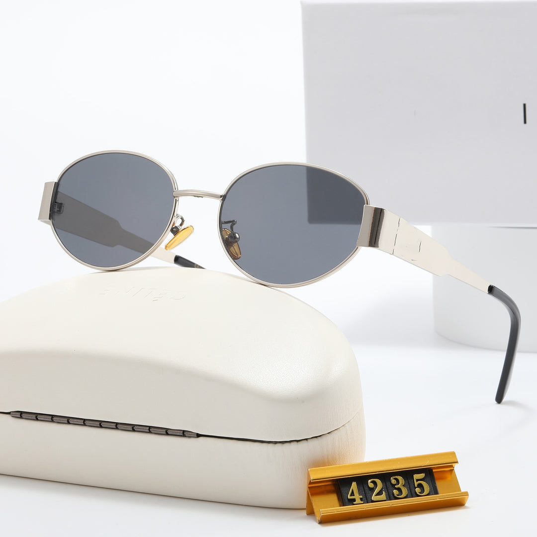 Ladies Elegant Designer Sunglasses with Filigree Frame and UV Protection Stornfield