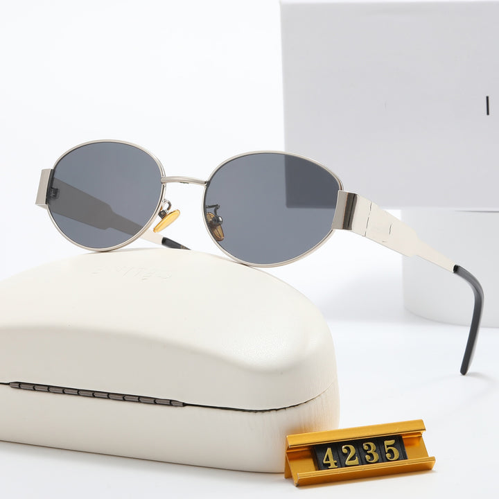 Ladies Elegant Designer Sunglasses with Filigree Frame and UV Protection Stornfield