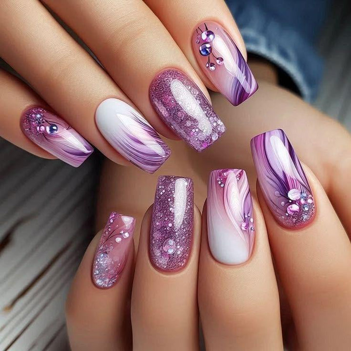 Glamorous artificial nails with filigree glitter decorations Stornfield