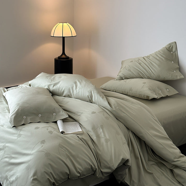 Premium duvet cover set made of cotton satin with tonal floral jacquard and button closure