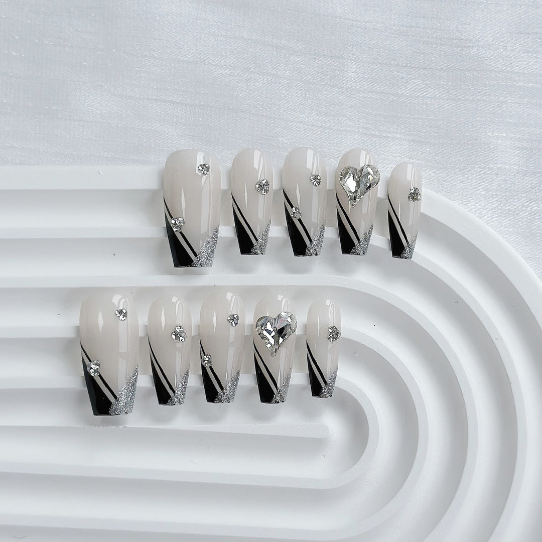 Artistic Press-On Nail Art Set with Heart and Celestial Designs