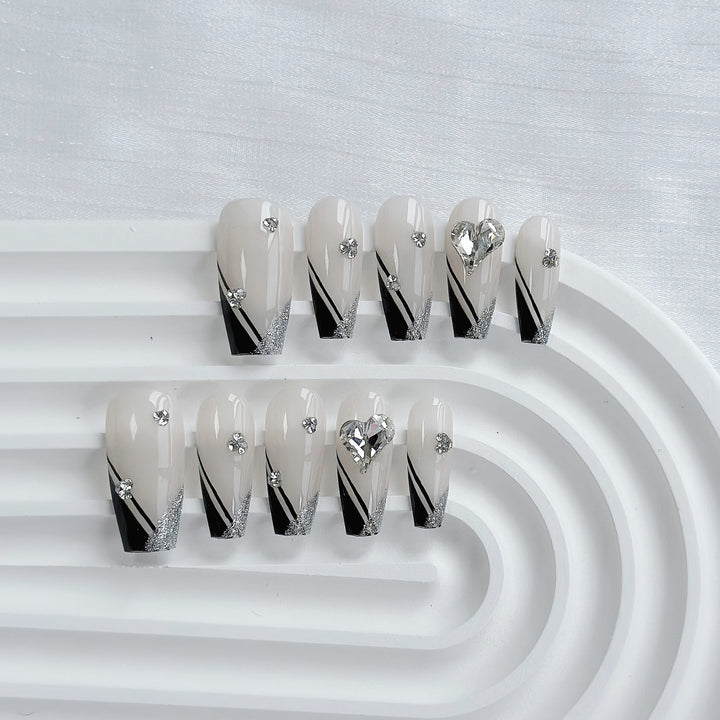 Artistic Press-On Nail Art Set with Heart and Celestial Designs