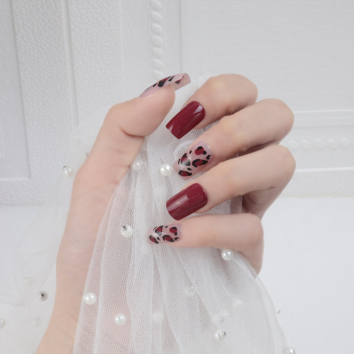 Artistic Short Press-On Nail Set with Leopard Print and Glossy Finish Stornfield