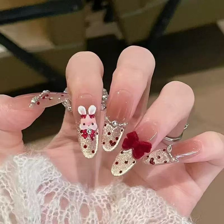 Artistic Stiletto Press-On Nail Art with Glimmering Accents Stornfield