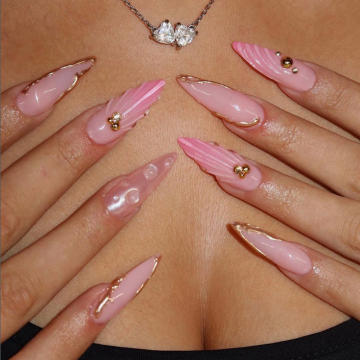 Luxurious artificial nails with elegant gold accent Stornfield