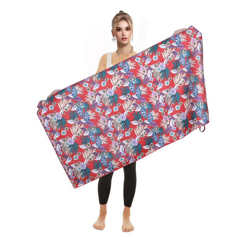 Women's beach towel with colorful flamingo design Stornfield