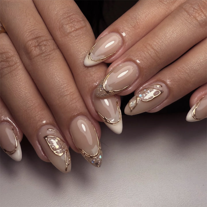 Elegant Stiletto Nails with Glitter and Spike Decorations Stornfield