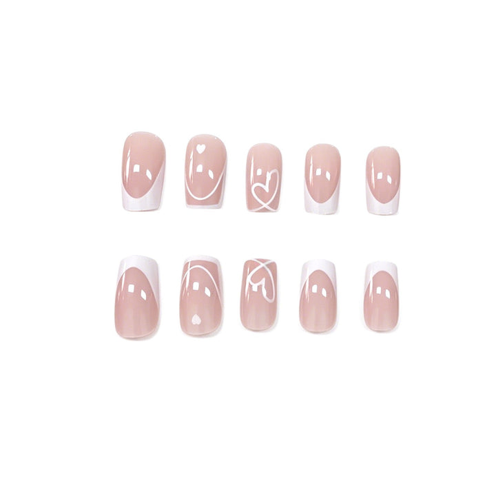 Heart-Embellished French Tip Nail Art Stornfield