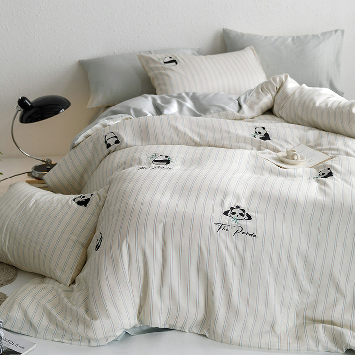 Quilted bed set with panda embroidery and fine stripe texture