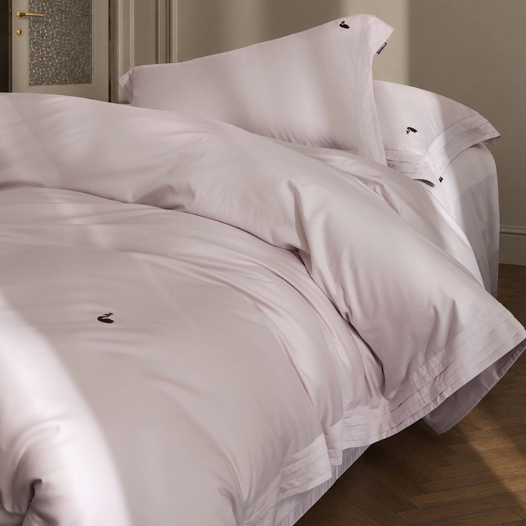 Fine-made duvet cover set made of Mako cotton with subtle monogram embroidery & pleated border