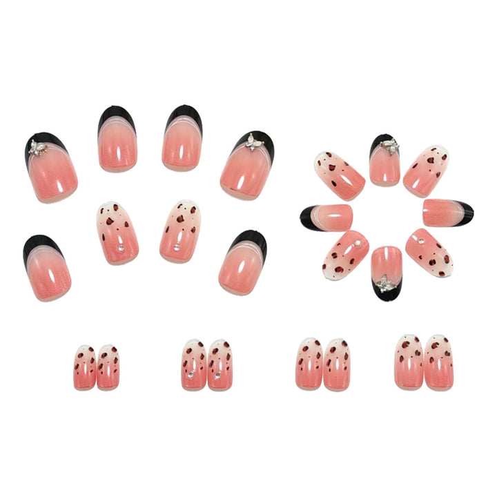 Exclusive artificial nails with dreamy heart and glitter effects Stornfield