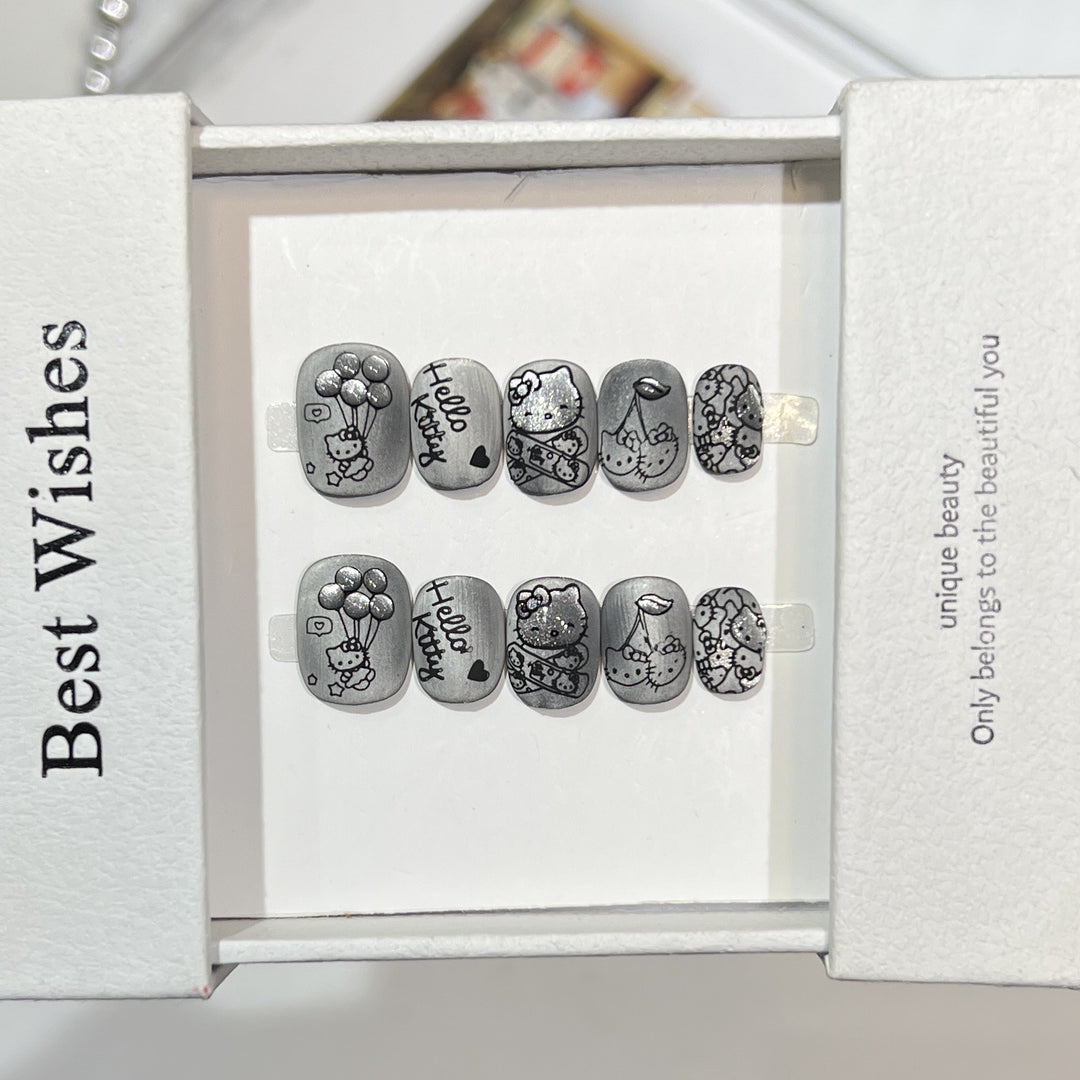 Artistic Press-On Nail Set with Whimsical Character Designs Stornfield