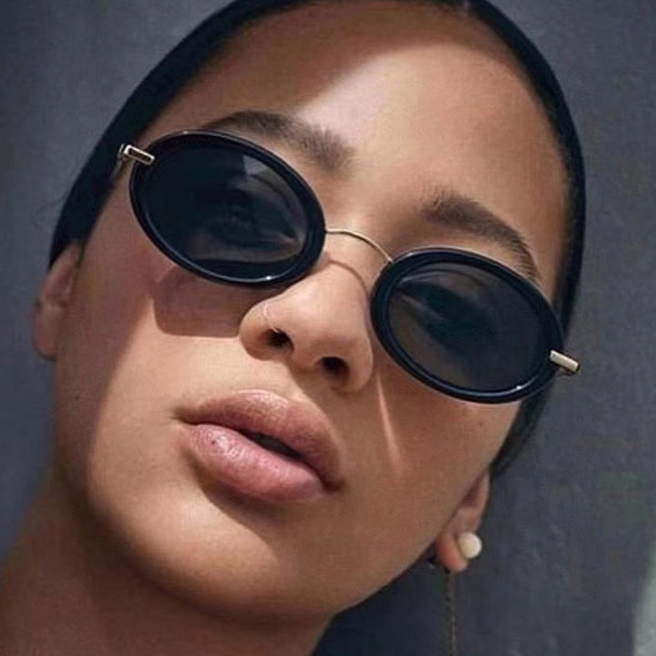Ladies fashionable sunglasses in elegant oval design Stornfield