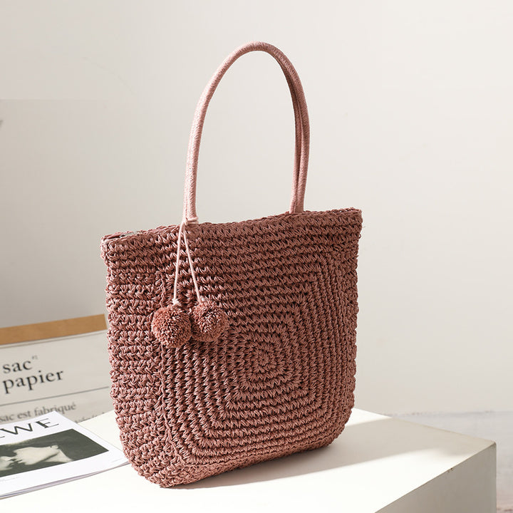Handmade straw bag with pompom details Stornfield