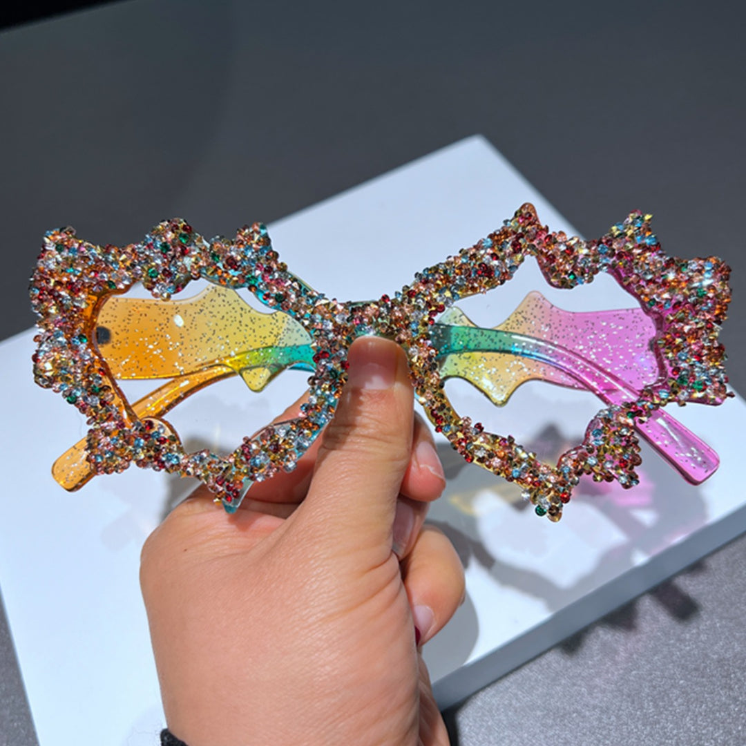 Ladies creative sunglasses in an extravagant design with glitter embellishments Stornfield